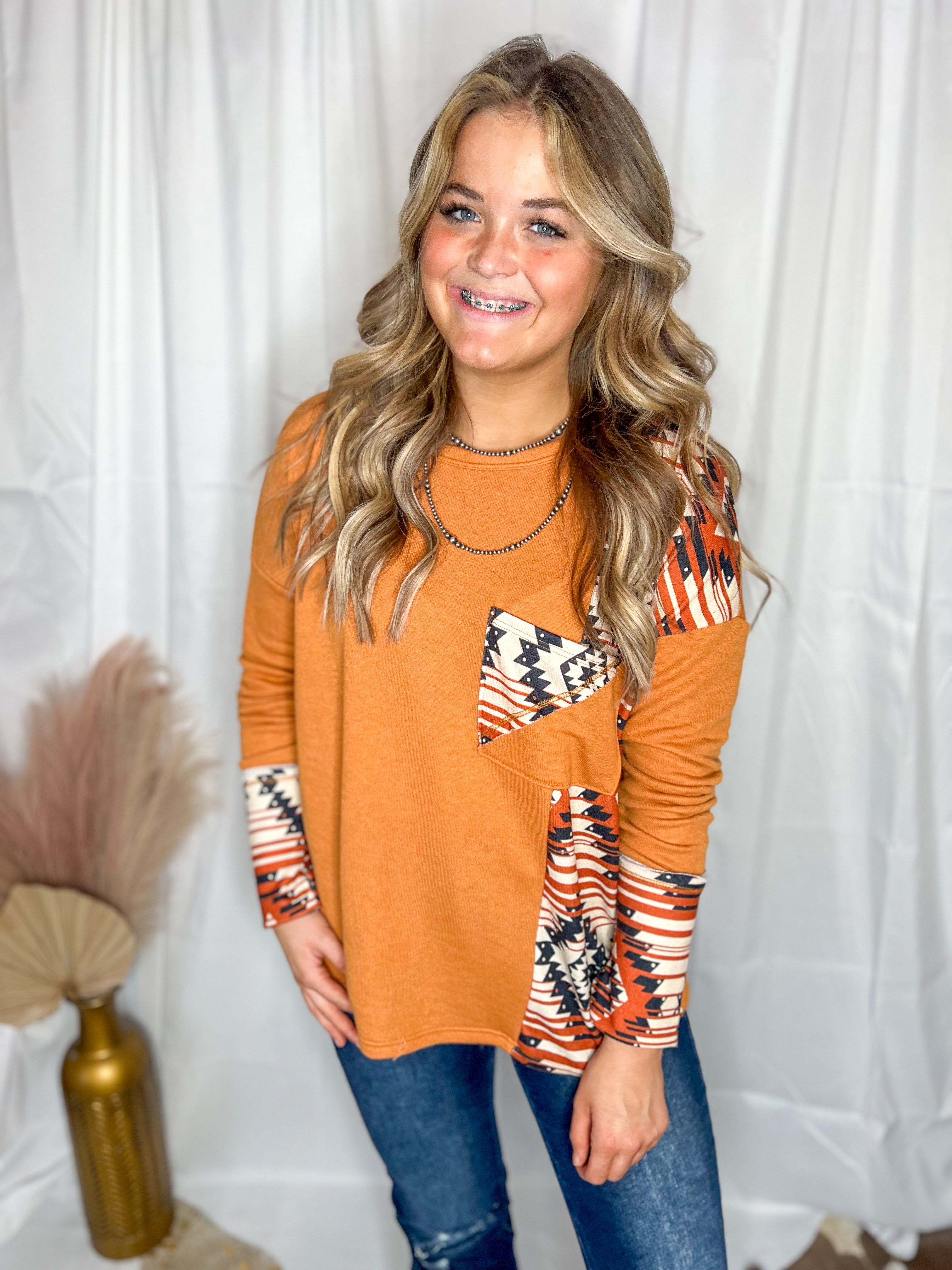 Burnt orange Aztec blouse