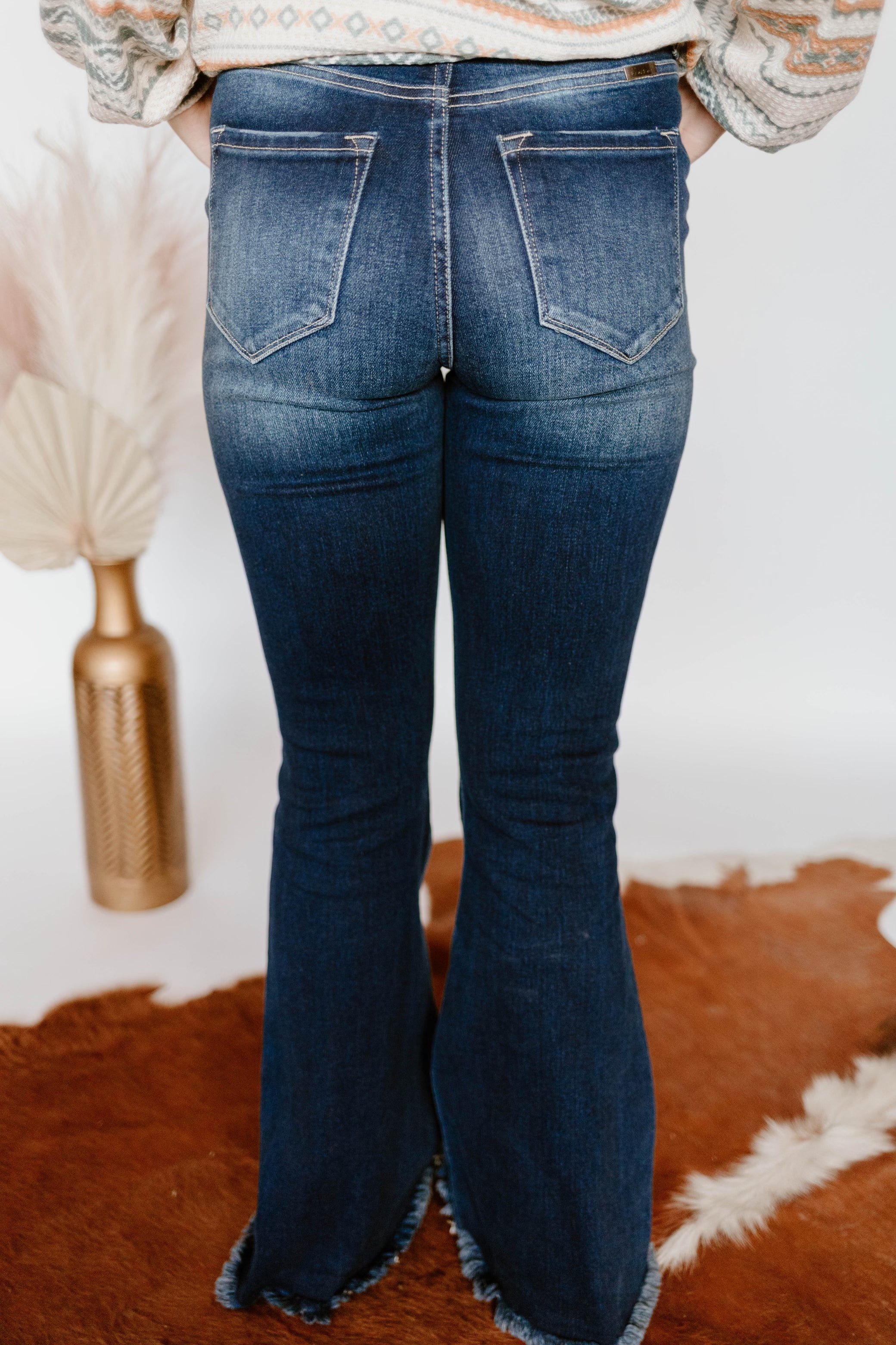 Dark wash distressed flares