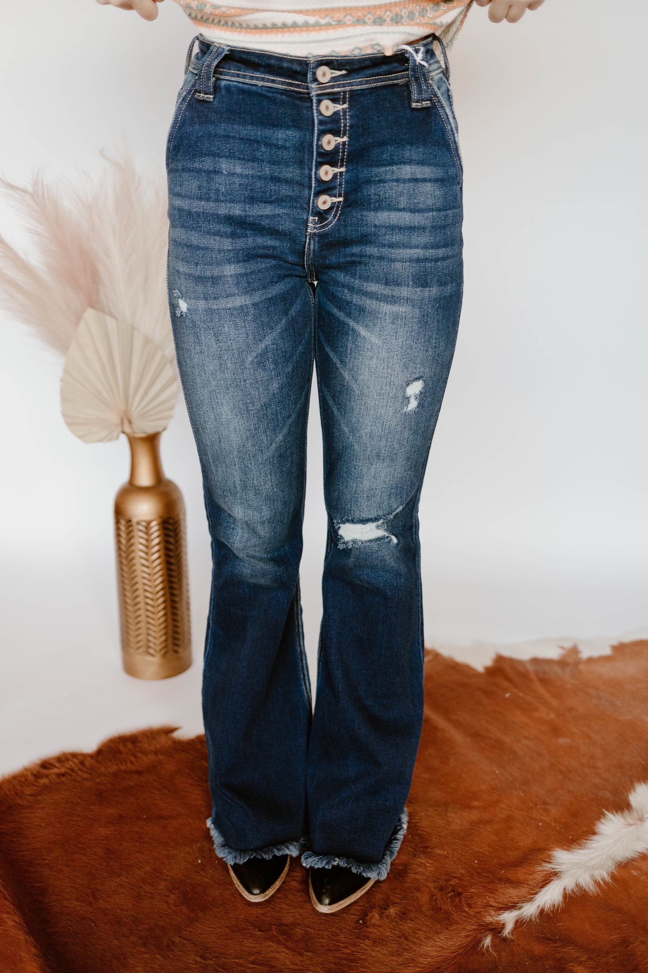 Dark wash distressed flares